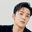 rowoon military enlistment postponed