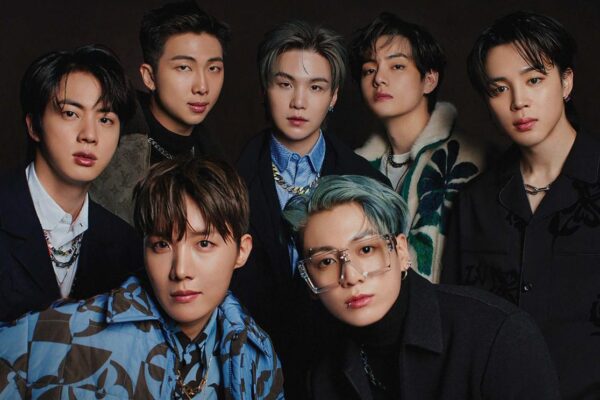 BTS Heads Overseas as a Full Group, RM Sparks Buzz With ‘Back in Business’ Message